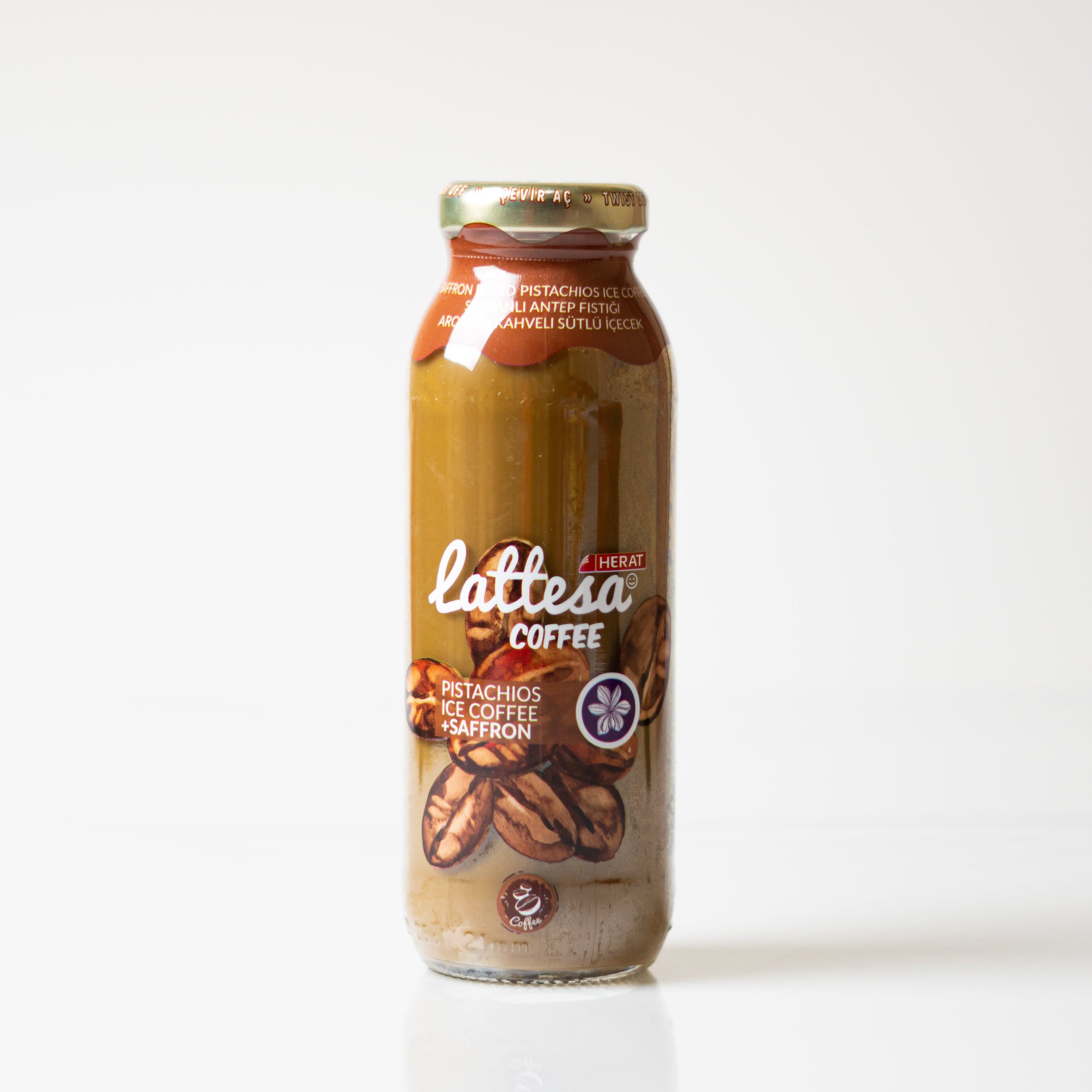 Bottle of Lattesa coffee with pecans on a white background