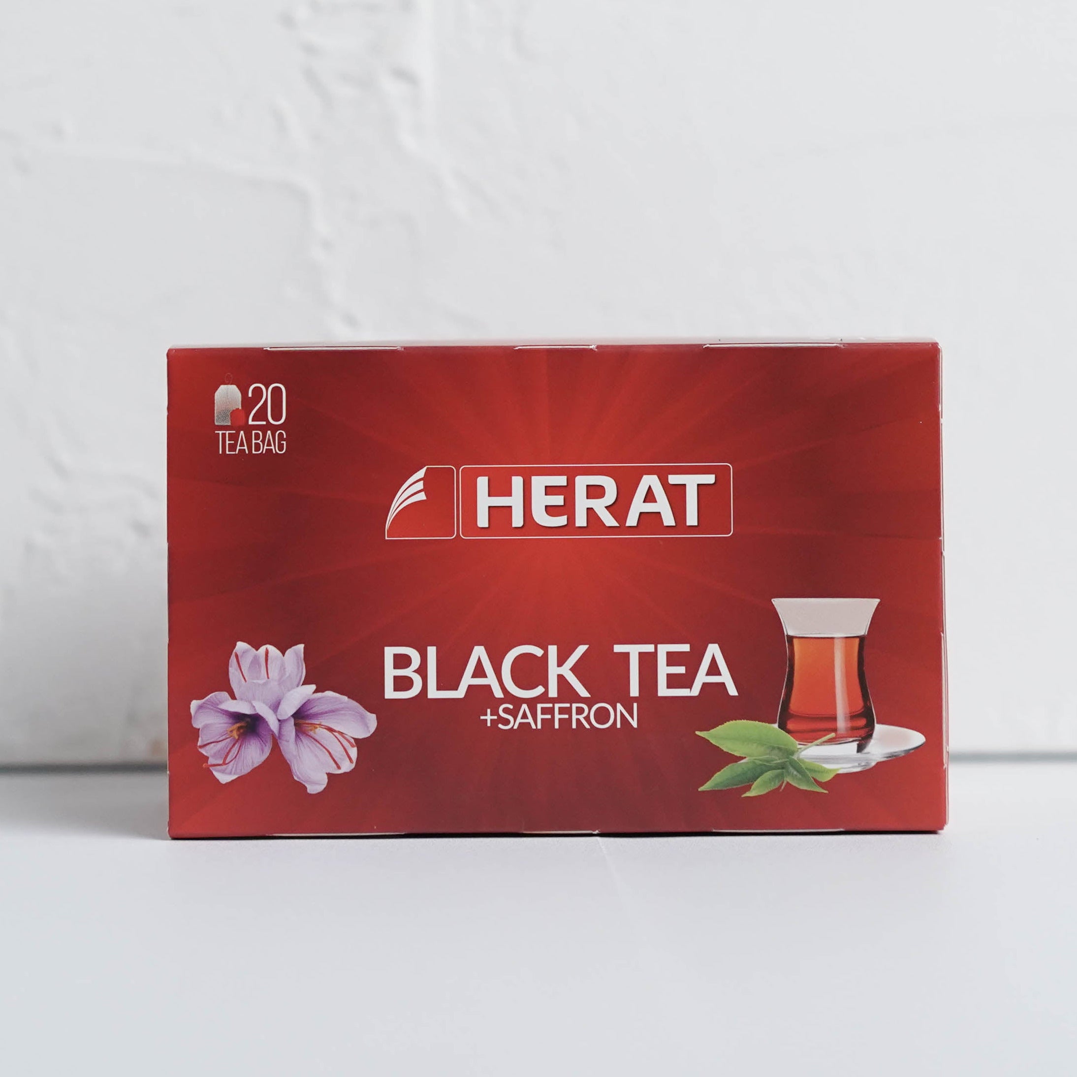 Red box of Herat Black Tea on a white background