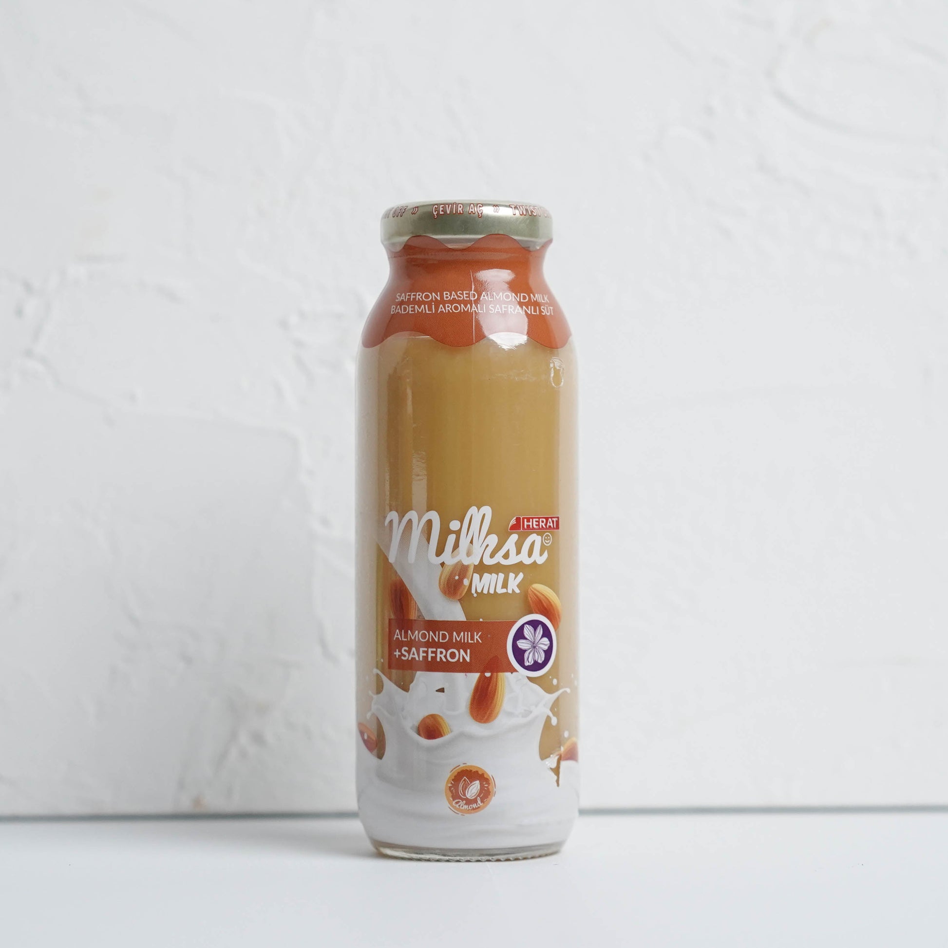 Bottle of Milka chocolate milk on a white background