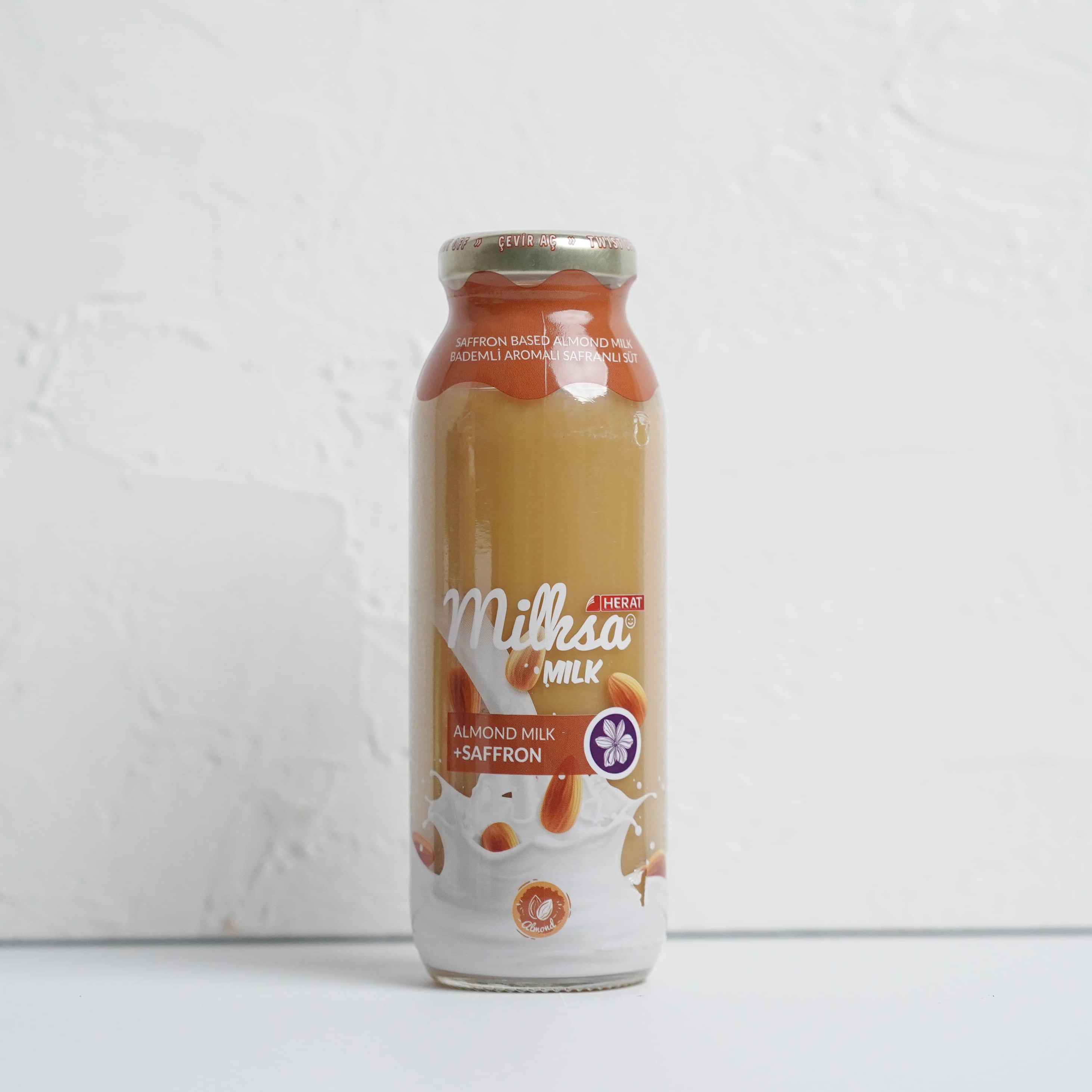 Bottle of Milka chocolate milk on a white background