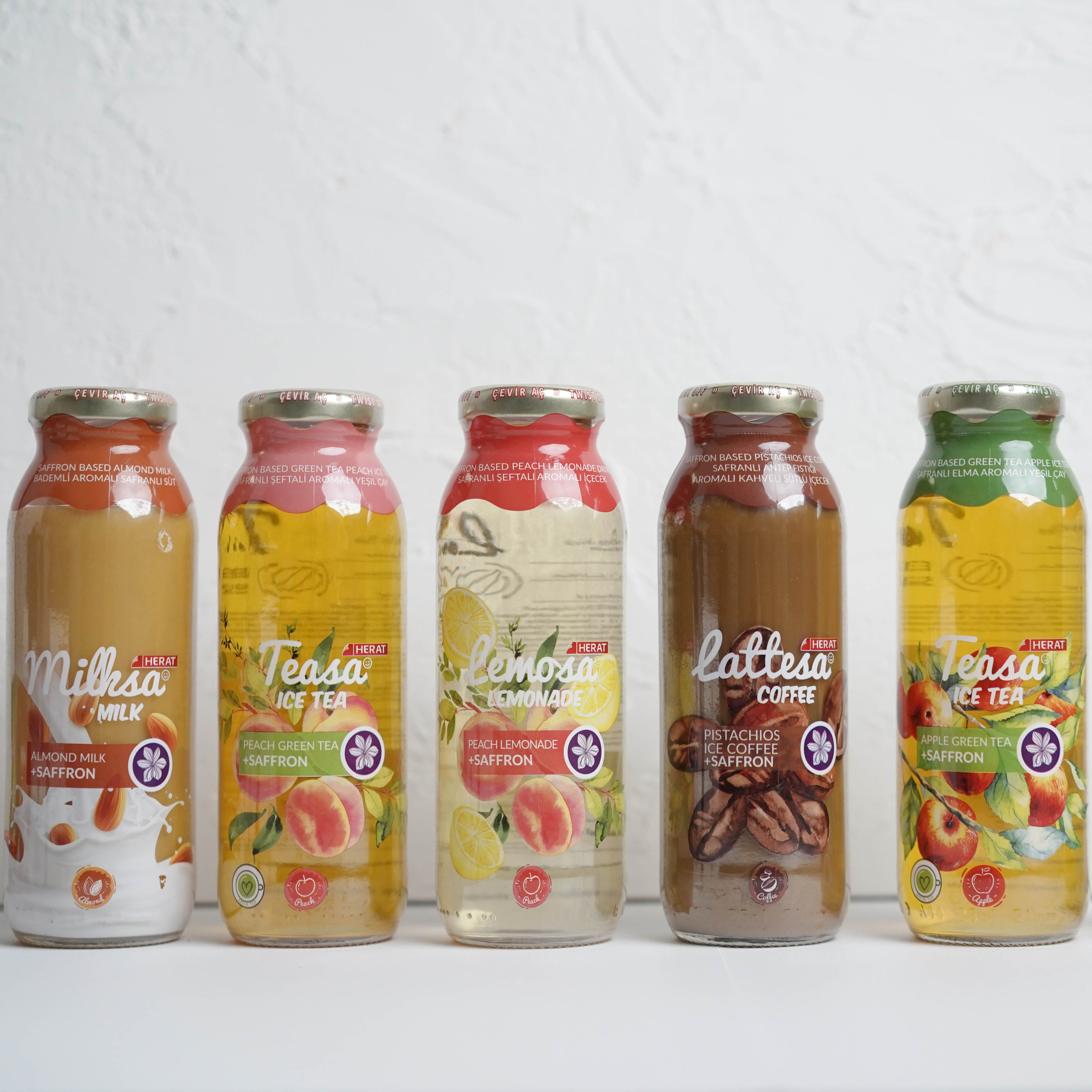 Row of Lattesia branded drinks on a white background