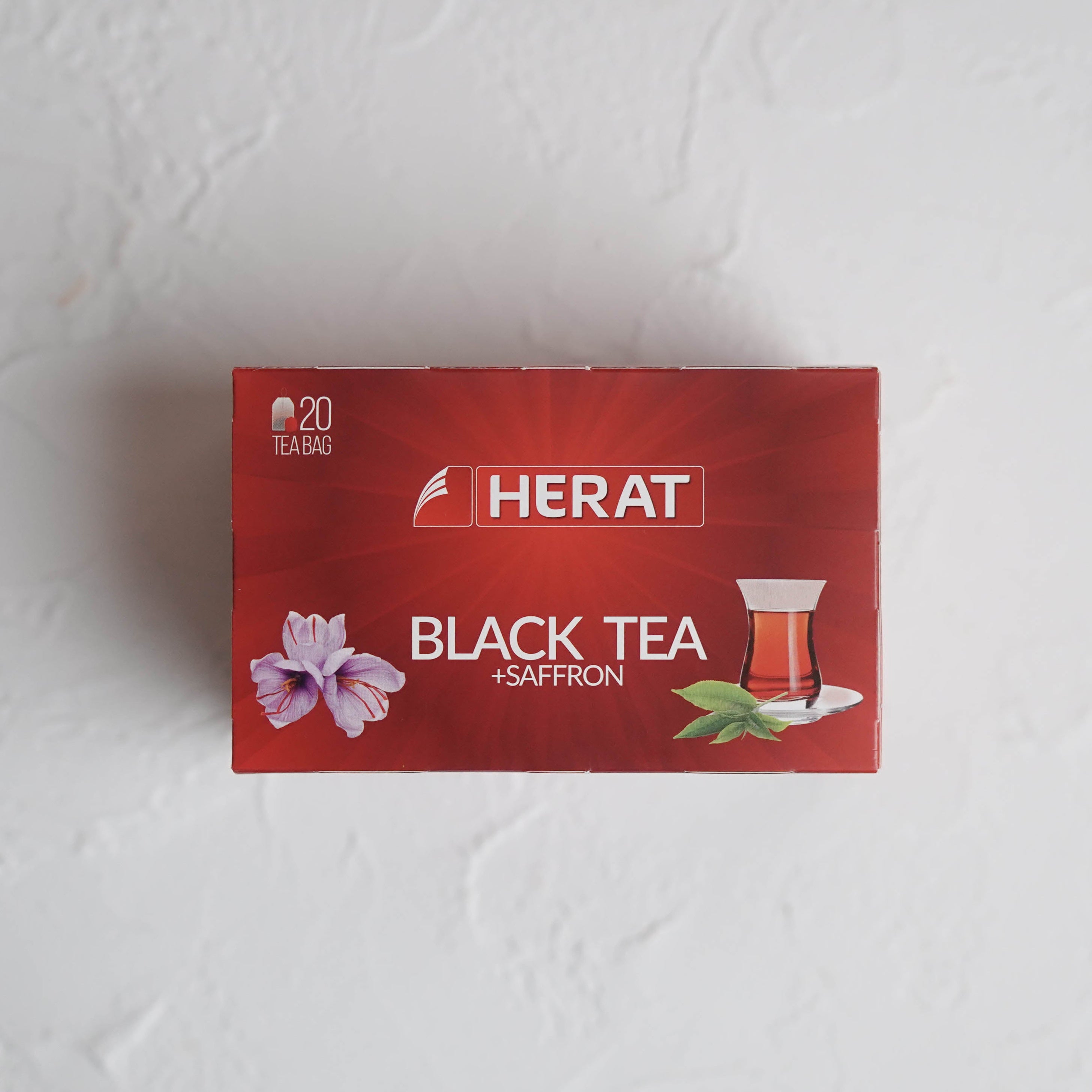 Red box of Herat Black Tea on a white background
