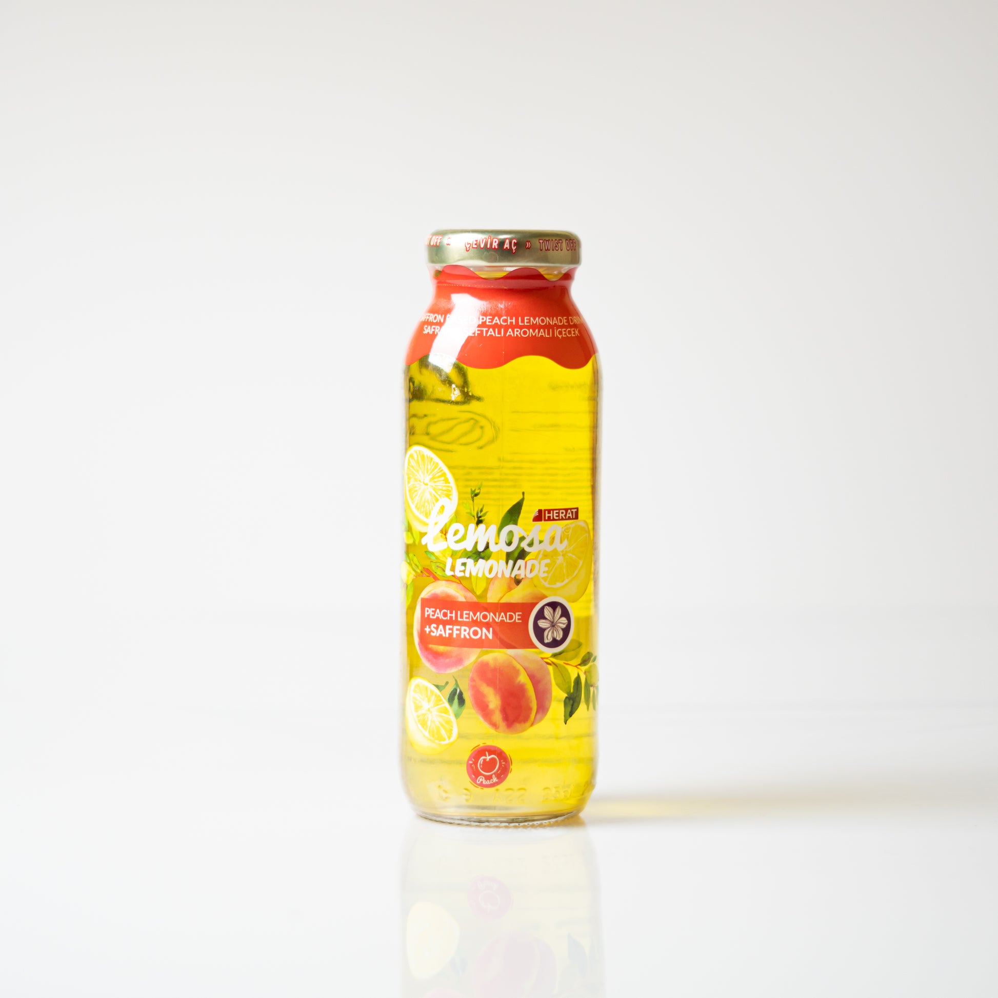 Bottle of lemonade with a colorful label on a white background