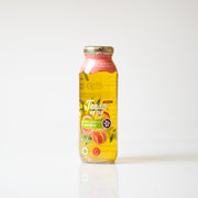 Bottle of Teaza iced tea with peach flavor on a white background