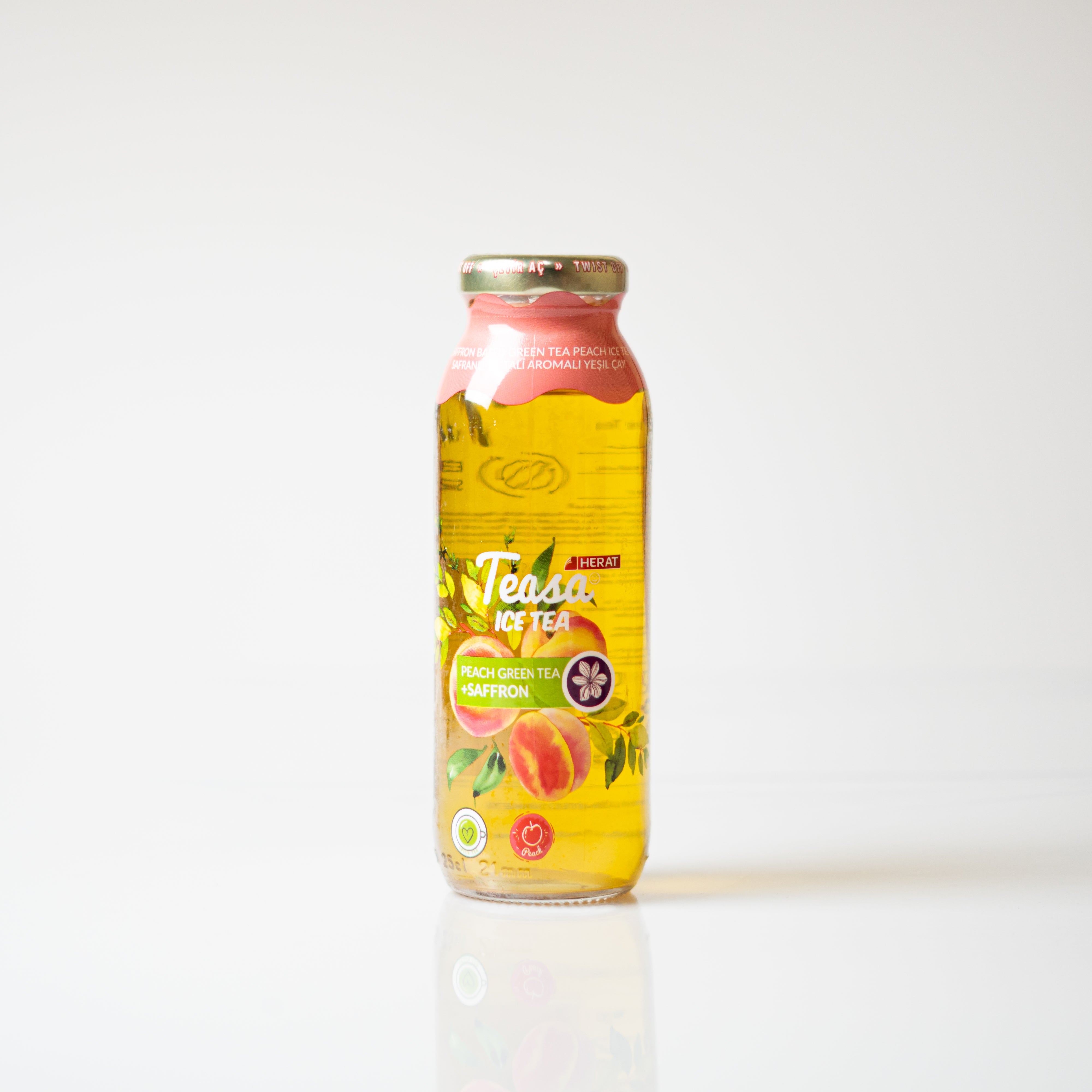 Bottle of Teaza iced tea with peach flavor on a white background